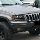 For 1999 - 2004 Jeep Grand Cherokee Headlights -Black Housing / Clear Lens / Amber Reflectors