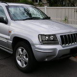 For 1999 - 2004 Jeep Grand Cherokee Headlights -Black Housing / Clear Lens / Clear Reflectors