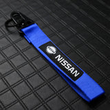 Nissan Set Blue Keychain Metal Key Ring with Black Carbon Fiber Look Seat Belt Covers
