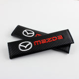 Mazda Set of Carbon Fiber Look Embroidered Armrest Cushion & Seat Belt Cover