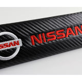Nissan Set Red Keychain Metal Key Ring with Black Carbon Fiber Look Seat Belt Covers